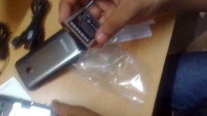 Samsung wave y unboxing. Inserting battery, memory card and SIM