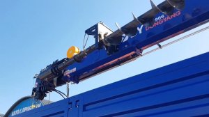 УРАЛ NEXT с КМУ DY SS1966, буровым оборудованием и складной кабиной оператора КМУ.