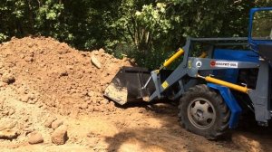 Погрузчик Фаворит-1000 Палехагромаш в работе 4
