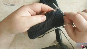 Шапка мужская вязанная на пяти спицах.