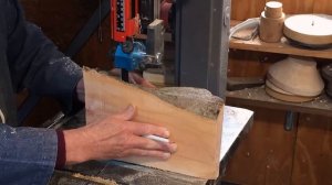 Richard Raffan converts pear logs to roughed bowls.