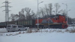 "В пургу" Маневровый тепловоз ТЭМ18ДМ-424 с полувагонами