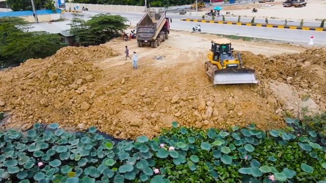 Строительство, дороги на озере