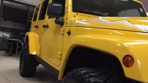 Baja yellow Jeep Wrangler bklassy