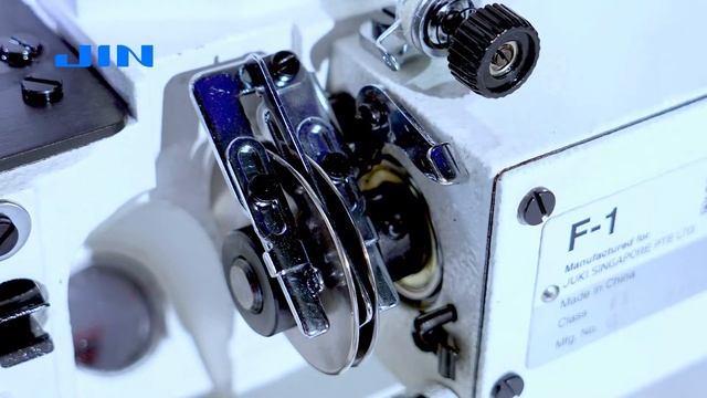 JIN F-1C- 3-х игольная, 5-и ниточная распошивальная машина с цилиндрической платформой.