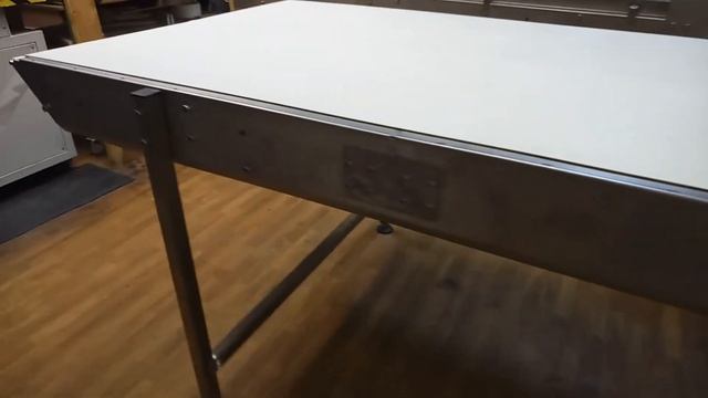 Ленточный конвейер с ножевым переходом.