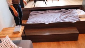 Подиум с выкатной кроватью с выходом на балкон | Мебель для квартир и студий