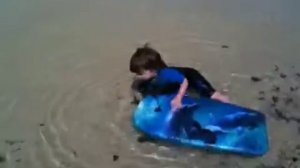 Levi and Eytan body boarding at Cornwall
