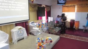 Budding Organist Maada Musa playing at Isaiah Musa's dedication