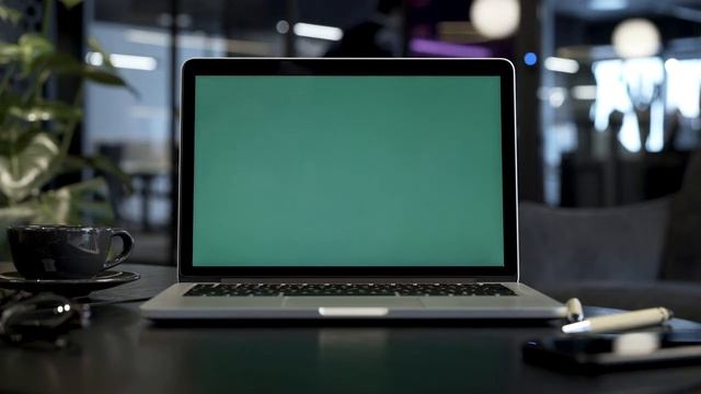 MacBook with a green screen at the office Free Stock Video office stock footage смотреть онлайн