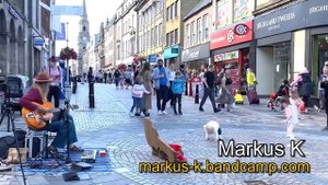 Kids Can’t Resist Busker’s Groove in Inverness - ‘Jumping Jack Flash’ (Stones)