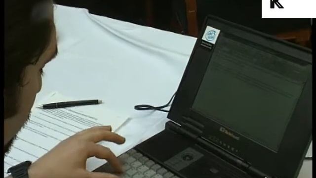 1990s Writer at Work on Laptop Computer, Author