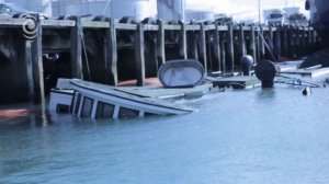 The Kestrel sinking at Wynyard Wharf