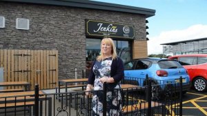 Fiona Snook at new seating area at Jenkins Cross Hands