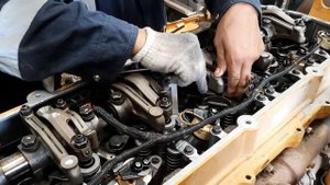 Install injector and valve lash adjustment. caterpillar C13