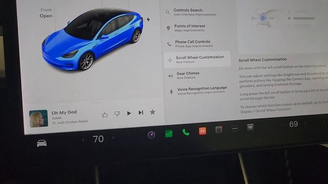 Tesla's new Scrollwheel customizations: push and hold the left steering wheel button.