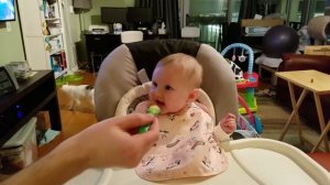 Baby doesn't like apples.