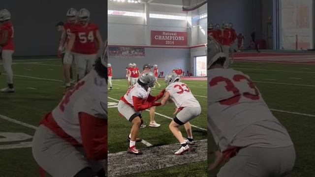 Ohio State defensive ends JT Tuimoloau and Jack Sawyer work on having active hands