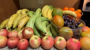 Mixed fruits Ripe plantain apples mangoes grapes banana and oranges May 11, 2022