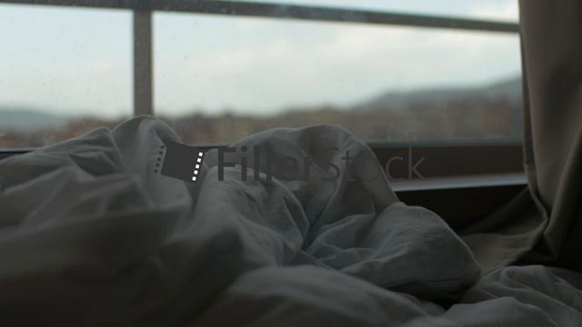 Rumpled blanket on the bed by window смотреть онлайн