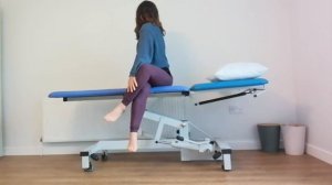 Seated Twist - a physiotherapy exercise to improve thoracic rotation