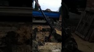 Кран-манипулятор з грейферним ковшом
