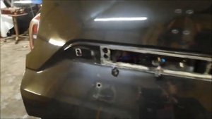 Удаляем вмятины на багажнике Дастере без покраски.