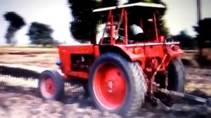 МТЗ 510 в работе с дисковой бороной