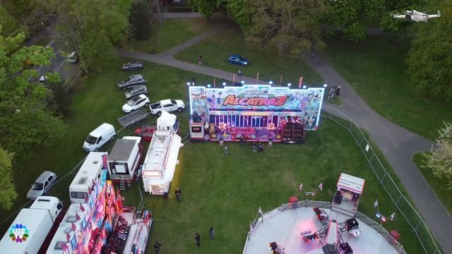 New DJi Mini 3 Pro, 4k Ultra HD Video Camera at Sunset over Funfair Wardown Park Luton England UK смотреть онлайн