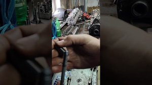 самодельное приспособление для  установки стопорных колец на направляющих клапанов головок ваз.