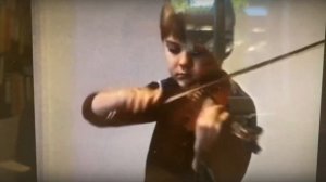 David playing the violin age 6