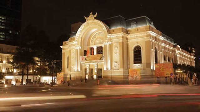 t l ws ld traffic going by saigon opera house at night ho chi minh vietnam ri смотреть онлайн