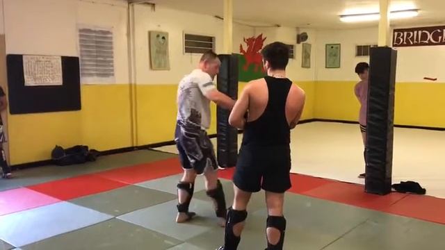 Checking the right kick in to spinning back kick смотреть онлайн