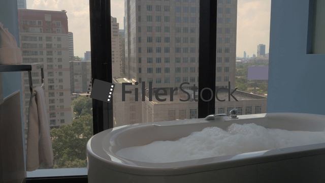 Bathroom with panoramic windows in the hotel смотреть онлайн