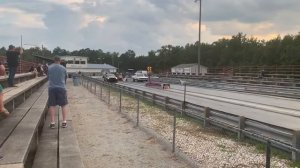 Plymouth gtx at the drag strip on street tires.