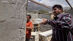 Busy day: guests in Doora to cooperate in construction of Fariba's house