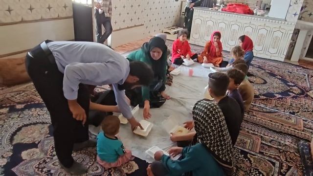 "The distribution of food for farmers and nomadic families by Engineer Babazadeh." смотреть онлайн