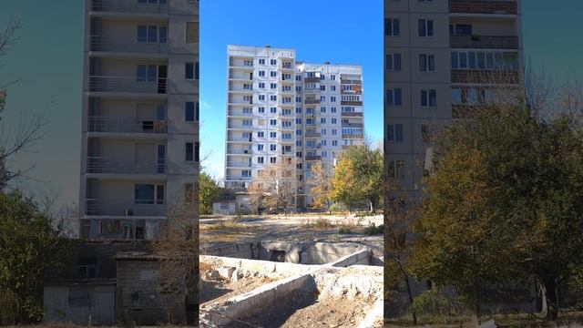 Мариуполь. Отремонтированный двенадцатиэтажный дом на Левом
