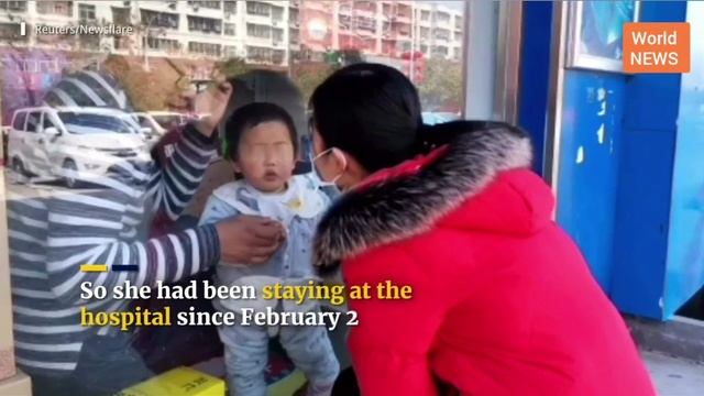 Chinese nurse kisses son through glass  after 26 days separation amid coronavirus outbreak