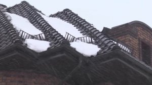 Дом-замок из кирпича на двухуровневом участке по собственному проекту
