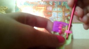 Как сделать цветочек из резиночек на рогатке.