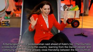 Kate Middleton giggles as she shoots out of children's slide