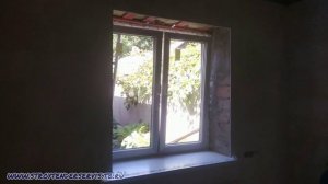 Металлопластиковое окно с двумя поворотно-откидными створками.