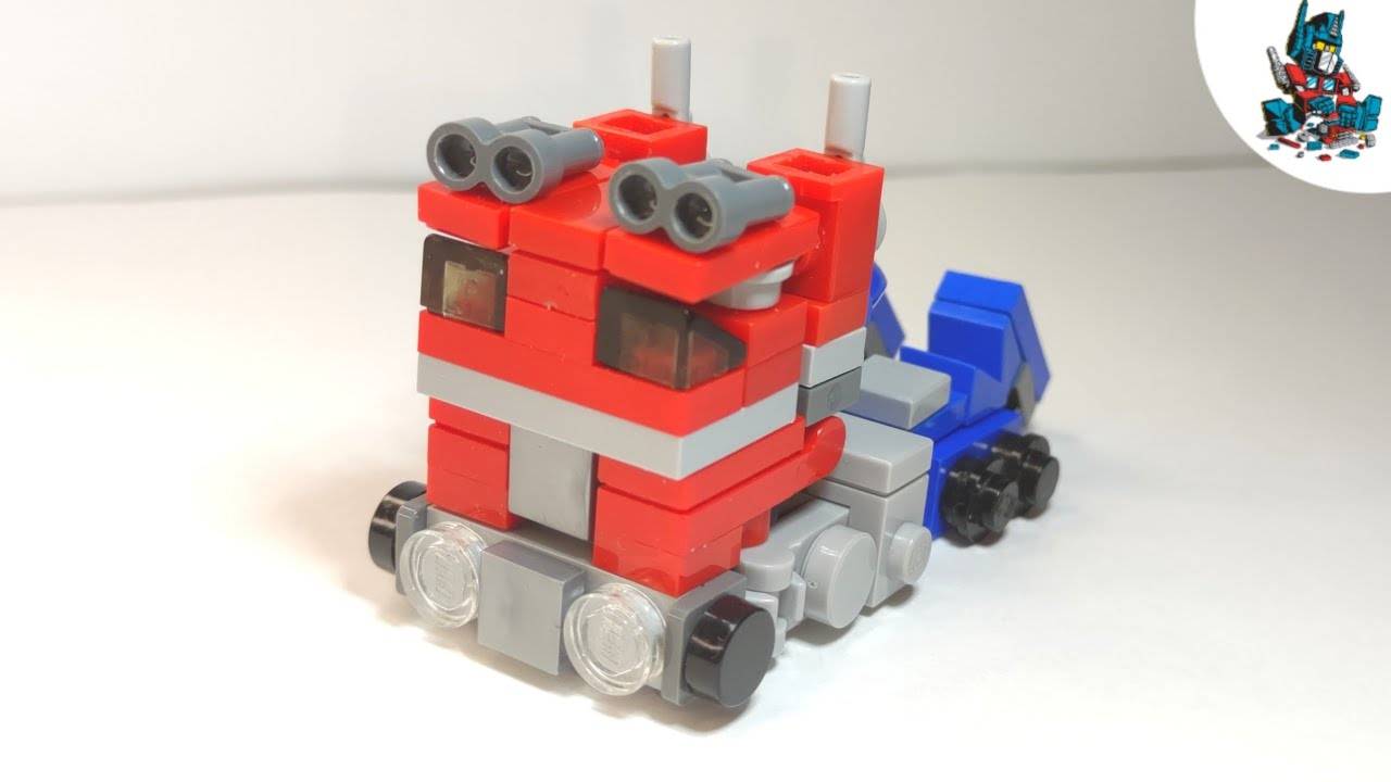 Как сделать трансформера оптимуса. Оптимус прайм g1 бумажная модель. Робот оптимус прайм из коробок. Оптимус прайм g1. Как сделать трансформера оптимуса.