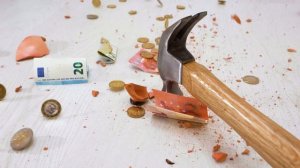 MEME - Hammer breaks piggy bank
