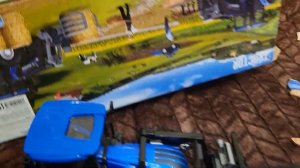 Синий трактор погрузчик на пульте Korody 1/24