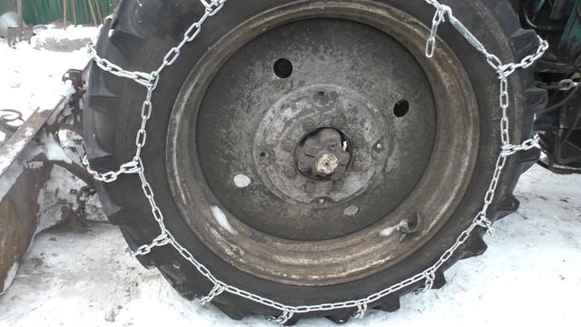 одевание цепей и обкатка. Цепи на Беларус.