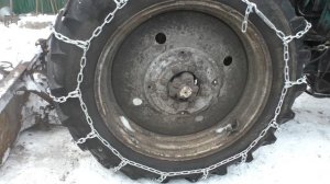 одевание цепей и обкатка. Цепи на Беларус.