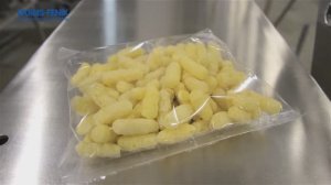 Фасовка и упаковка кукурузных палочек на упаковочном станке ПИТПАК 1005 с дозатором