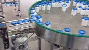 Фасовка продукции в баночки и закрытие их крышками на станке ПАСТПАК 4Л